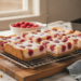 Frambozen-cheesecake repen bakken voor een romig zomers baksel